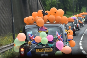 Taxis on motorway in convoy